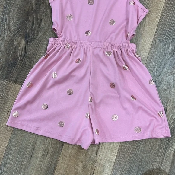 Body glove romper smiley face pink with gold smiles. Size 7
Sleeveless - Picture 10 of 12